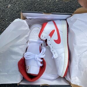 Nike White and Red Air Jordan 1s